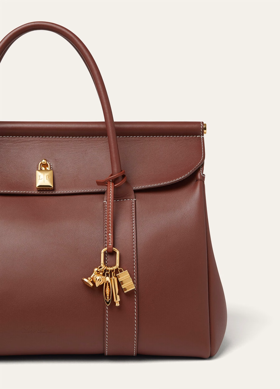 Llaveros de aniversario para bolsos Deep Kummel/Jewel Sun Gold de piel de becerro.