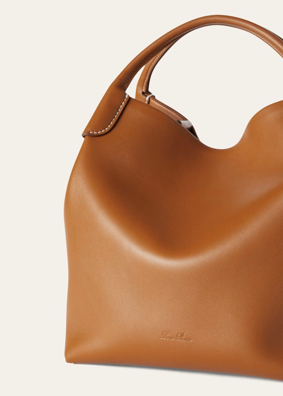 Bolsa grande para fardos de piel de becerro lisa color tostado cálido